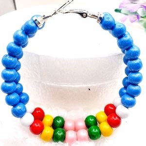 Large wooden hoop earrings, wooden hoop earrings, large beaded hoop earrings.